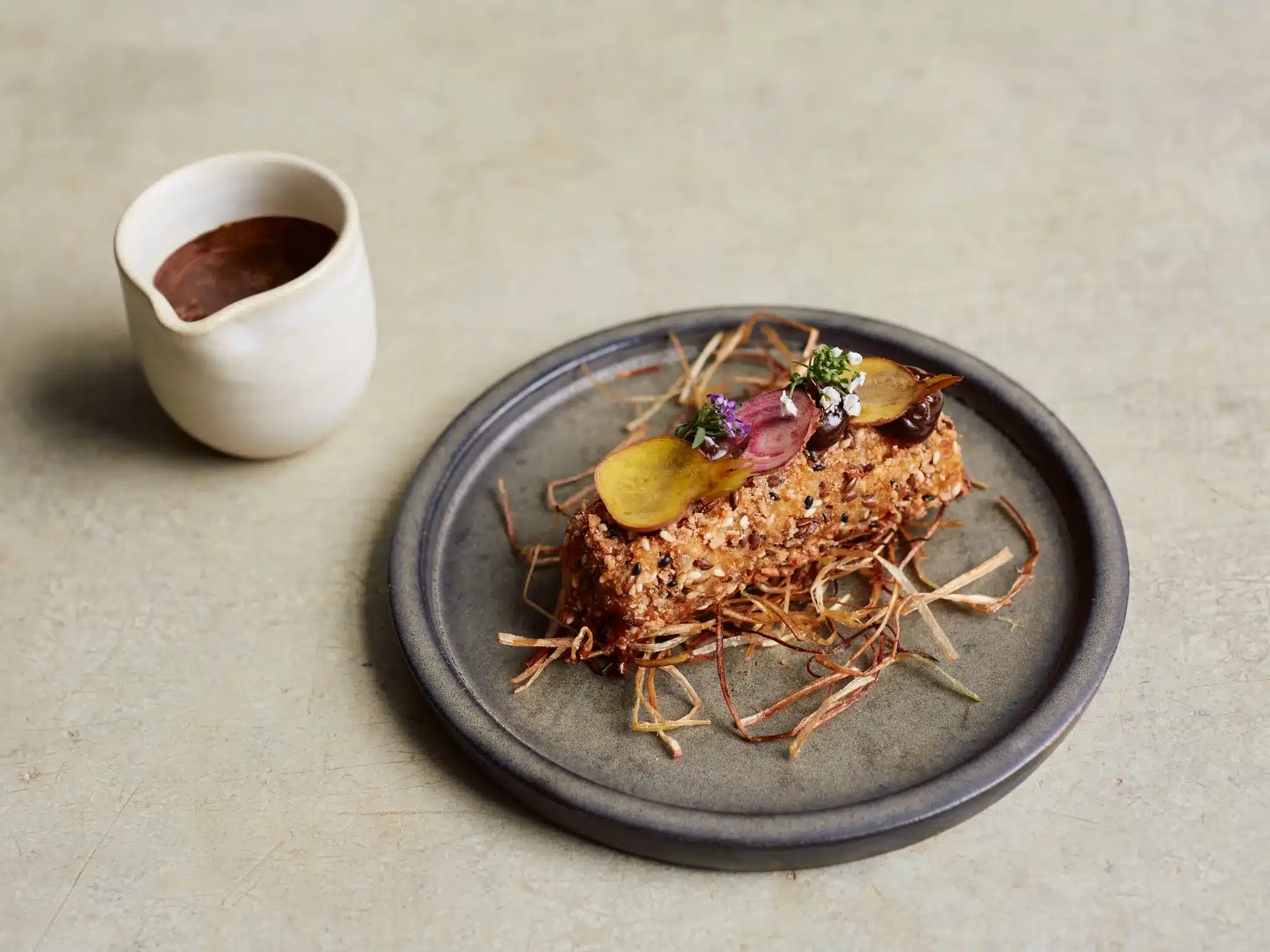 Holy Carrot Cowspiracy Shepherd S Pie Croquette With Smoked Beets, Crunchy Onion Hay, Black Lentils, Thyme Sauce By Lesley Lay