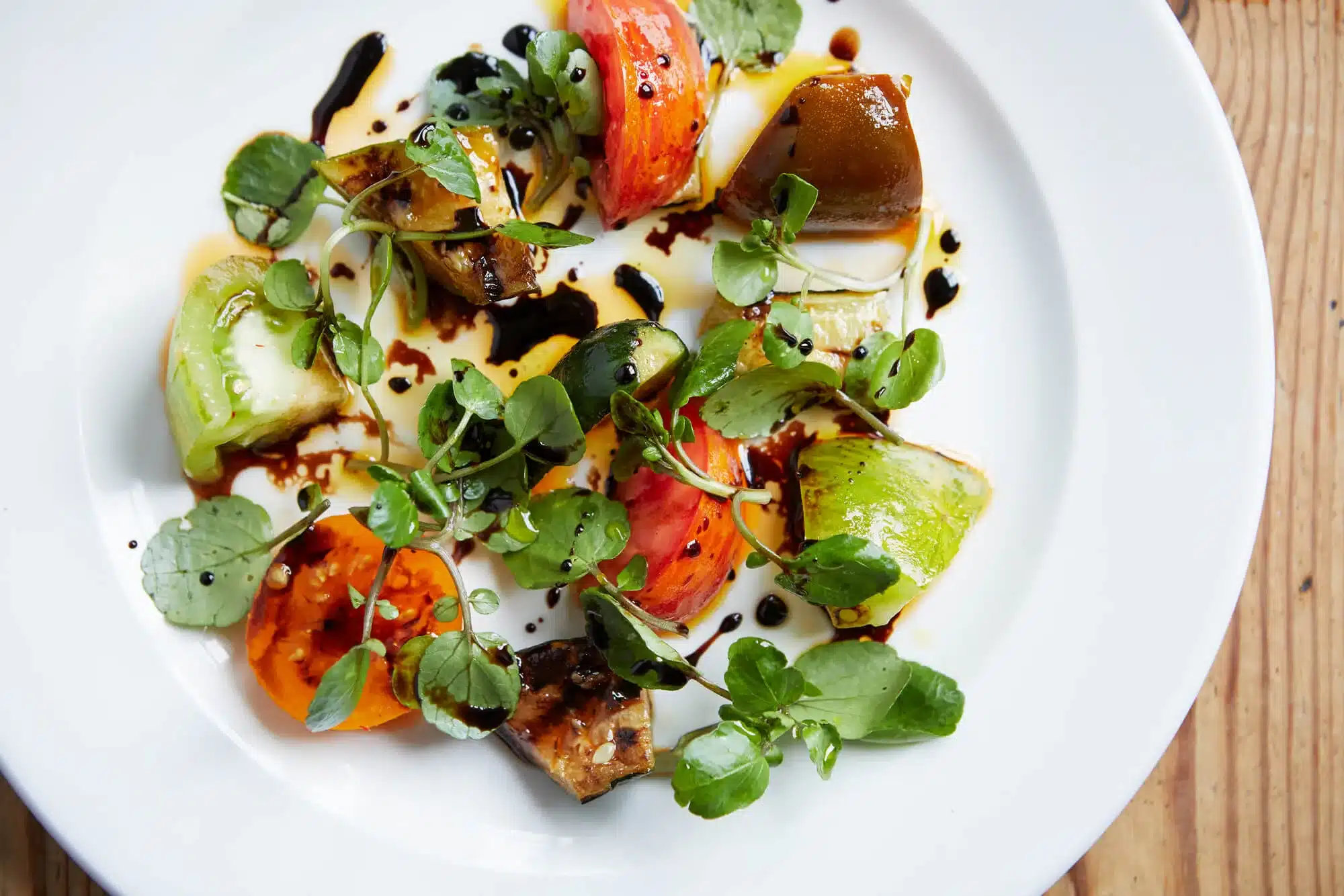 aa heritage tomato chilli marinated courgette salad with balsamic reduction 